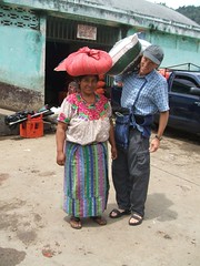 Corn on her head and Randy's shoulder